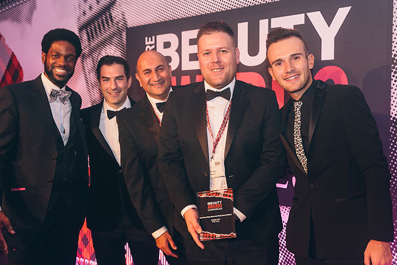 John Toner presenting at the 2019 Pure Beauty Awards in London