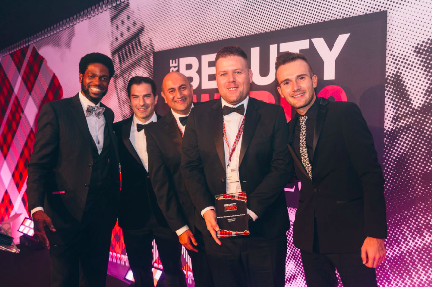 John Toner from Aprinnova (second left) joined Layne to present an award last year